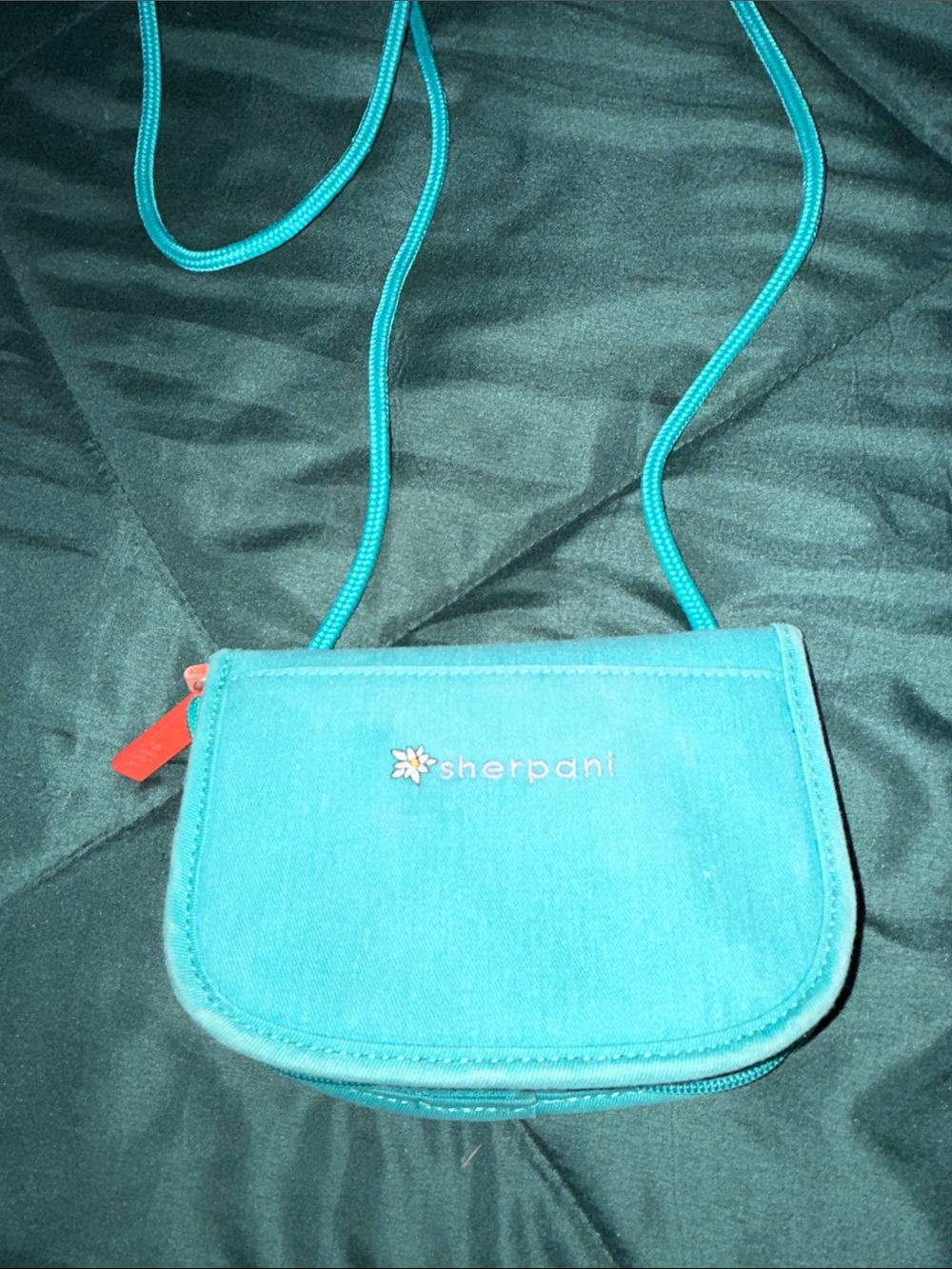 Sherpani Teal Mini Crossbody Pouch with Coral Zip Pull
